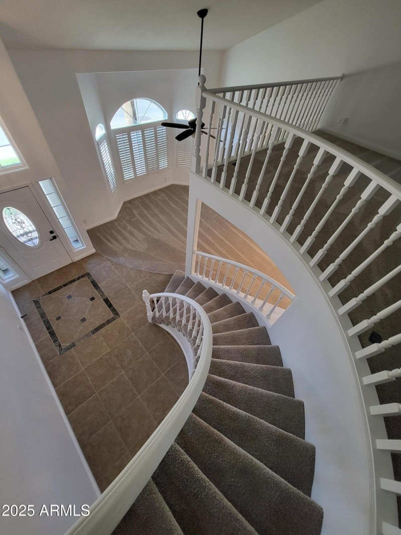 GRACEFUL SPIRAL STAIRCASE TO GRAND VIEW