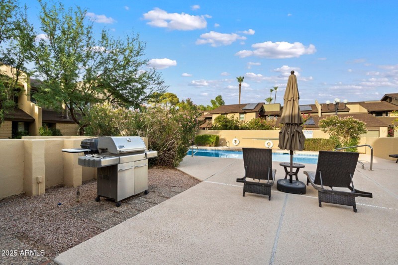 Grill and Loungers at the Pool