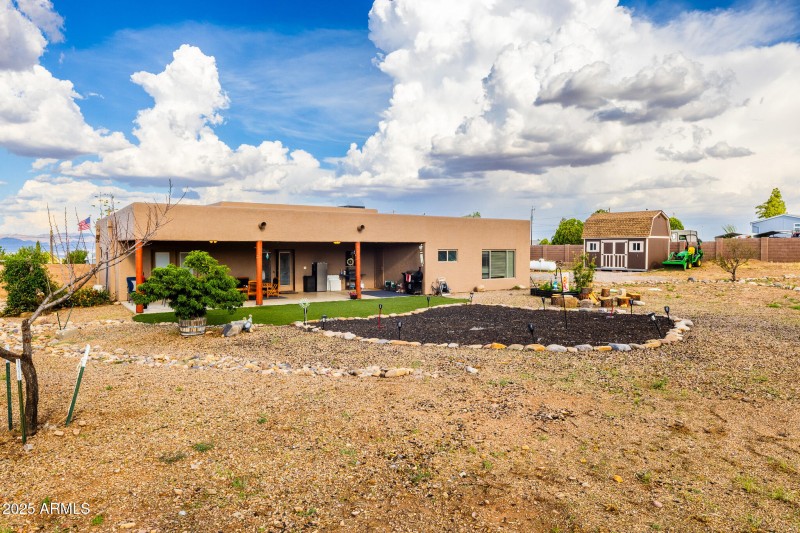 6248 S De Mello ST.