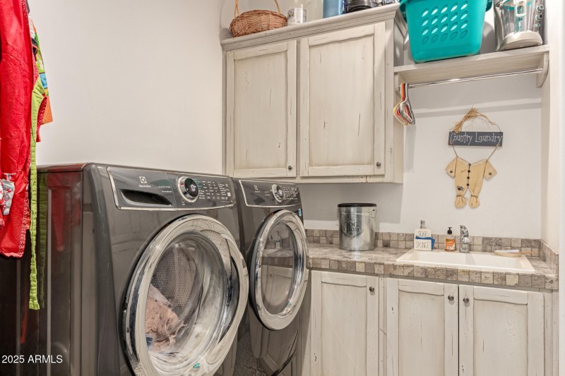 Laundry room with custom cabinets