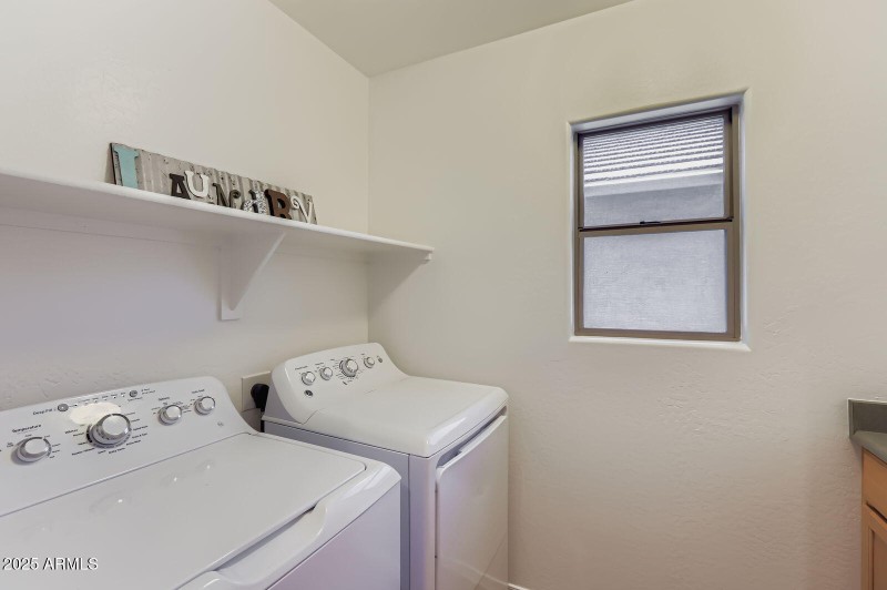 Upstairs laundry with sink