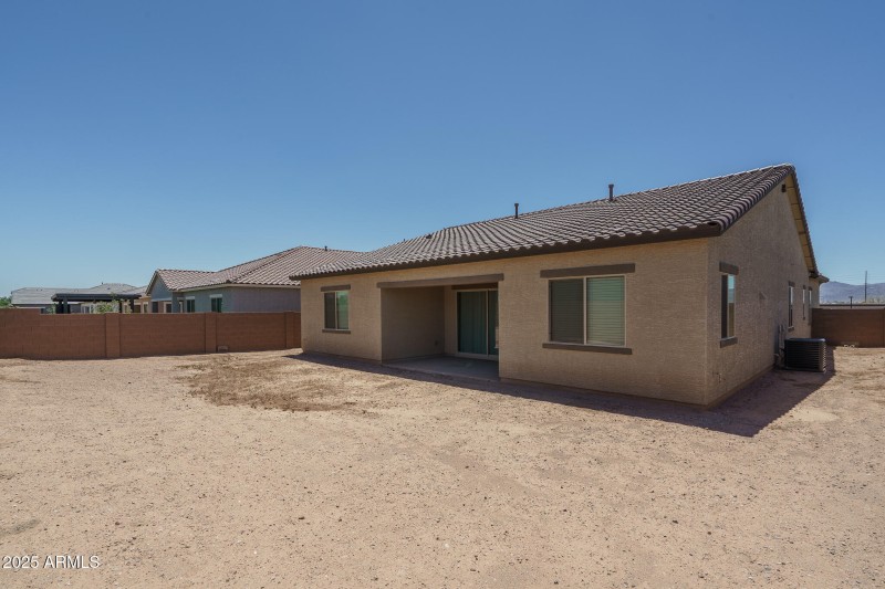 25) BACK OF HOME