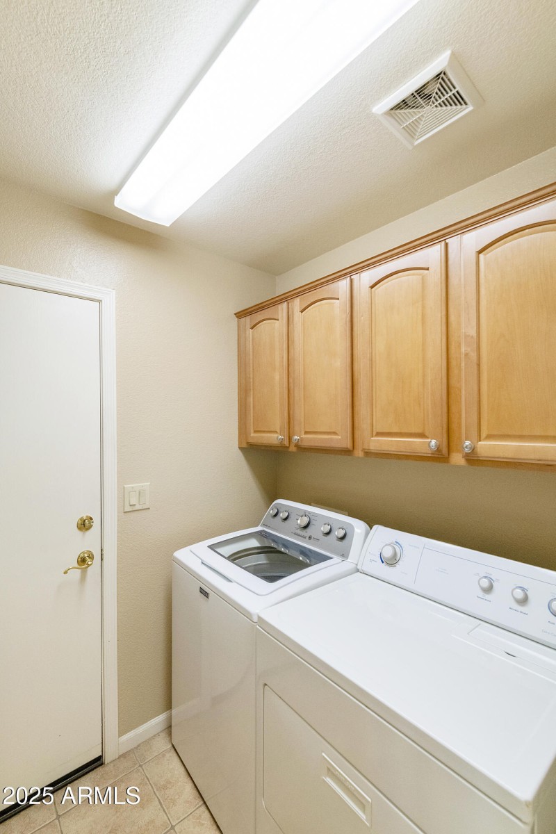 Laundry with cabinets