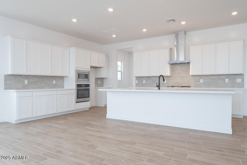 Tri Pointe Soleo 334 - Kitchen-1MLS