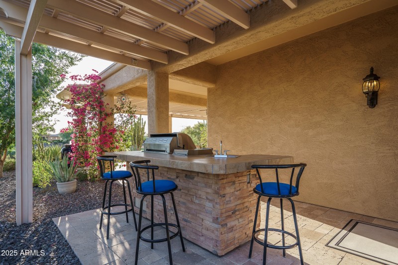 76) OUTDOOR KITCHEN
