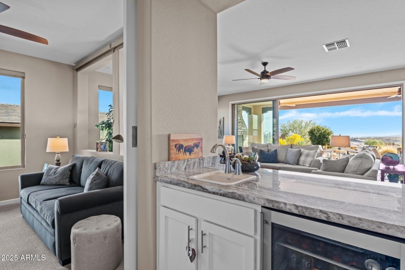 Wet bar leading to den