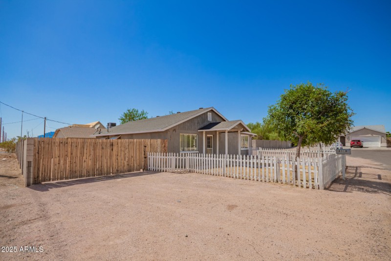 8310 E University Dr. front left side