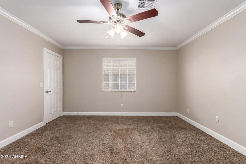 Primary bedroom with wlak in closet