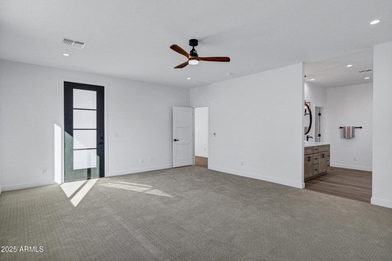 Primary Suite w/ Door to Backyard