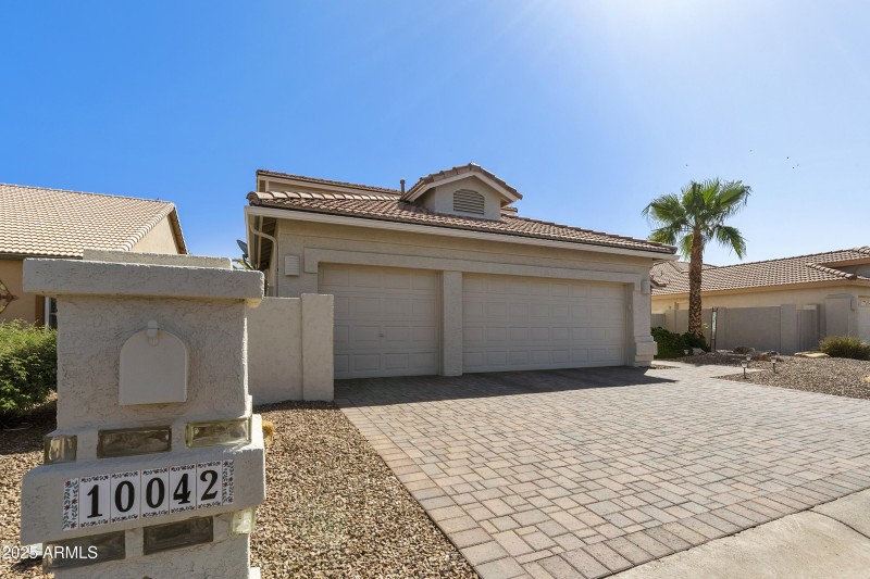 3-car Garage and paver driveway