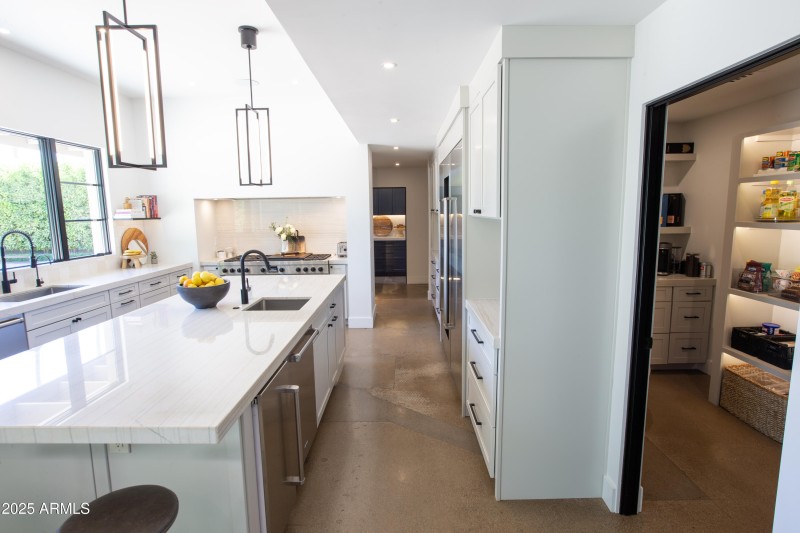 View of Kitchen w Pantry