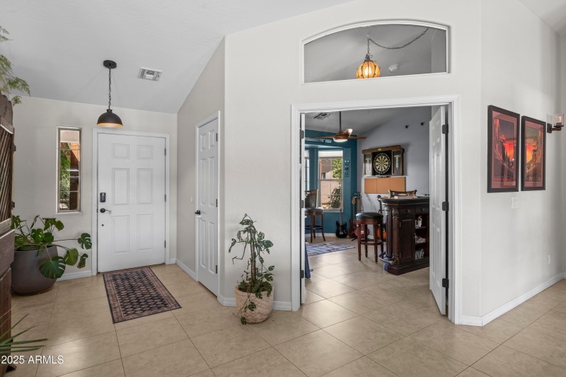 Elegant entry way den to the side