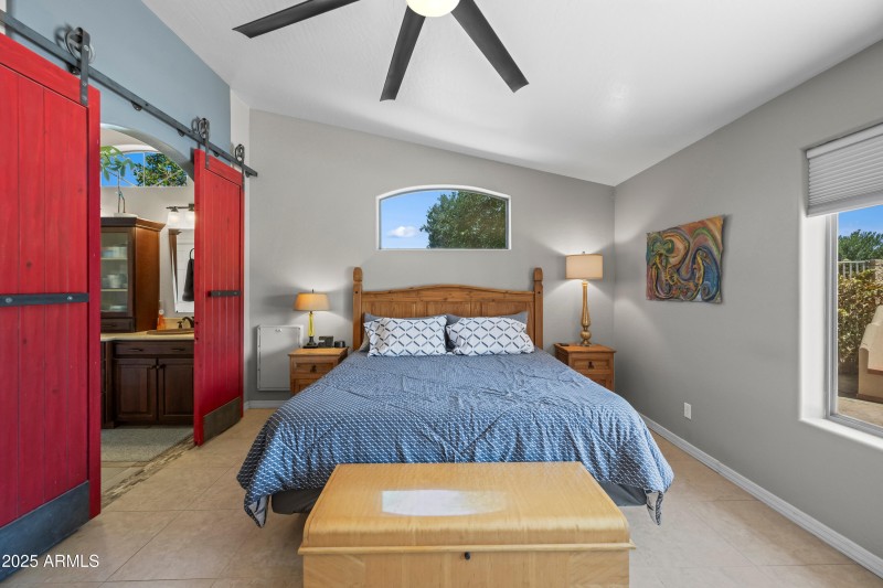 Master bedroom red doors to bathroom