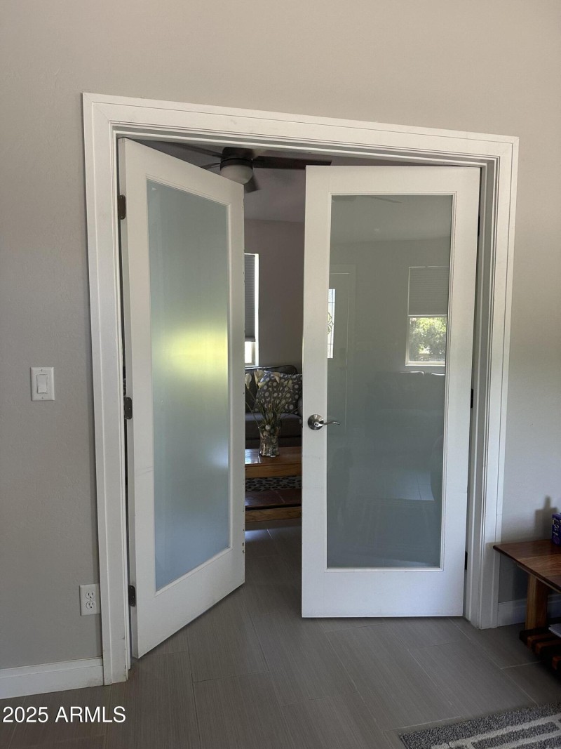 Guest house double doors T the den