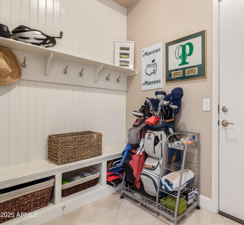 Mudroom/cloakroom area leads to