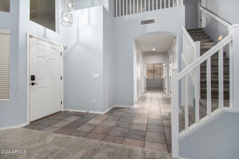 Entry Hall view to upstairs & Ofc-Den-5t