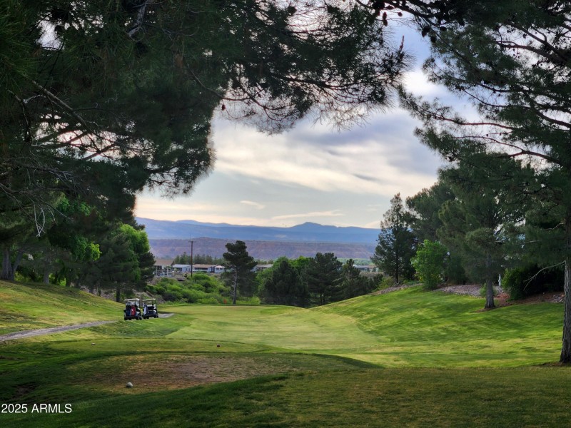 View of golf course from screen porch