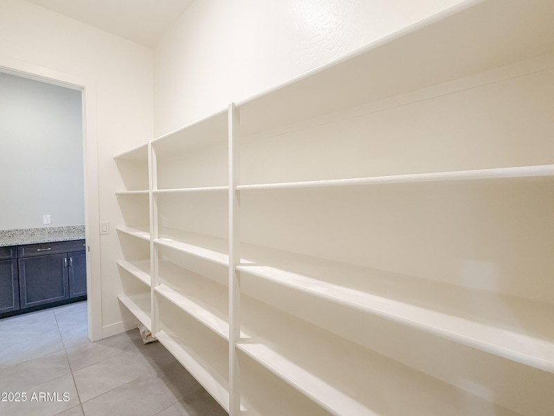 Walk-Thru Pantry to Butler's Pantry Area