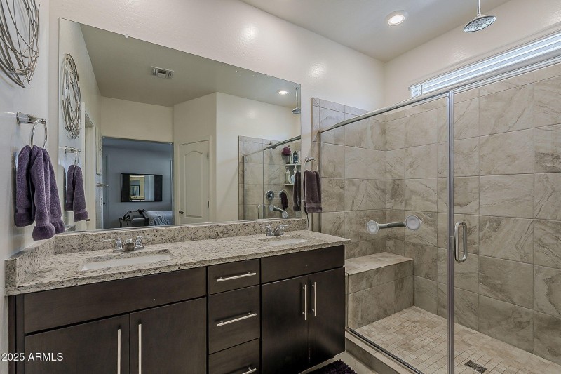 Primary bathroom with double sinks.