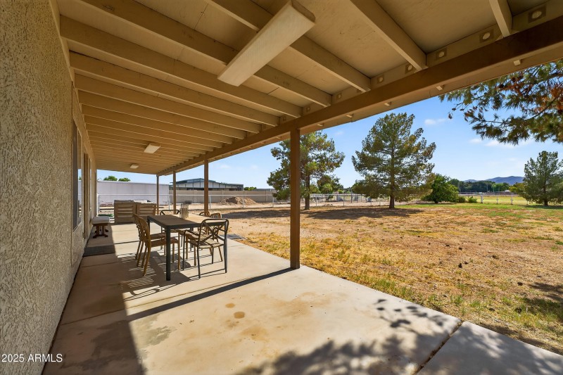 Full-length back patio