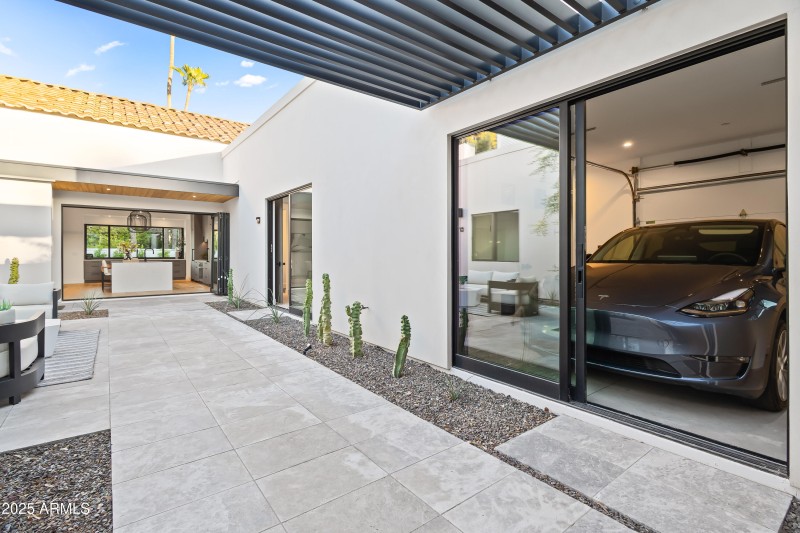 COURTYARD VIEW TO SHOW GARAGE