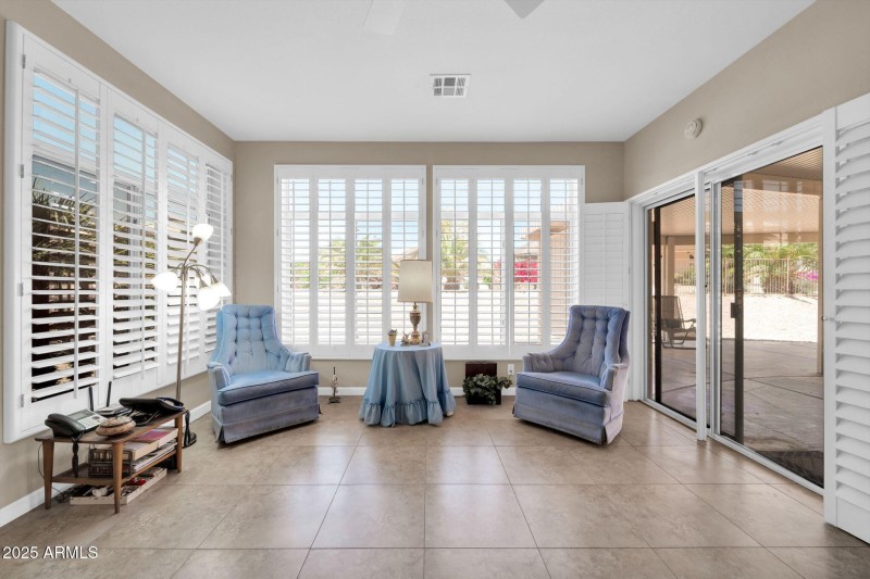 THE SLIDER LEADS TO THE OVERSIZED PATIO