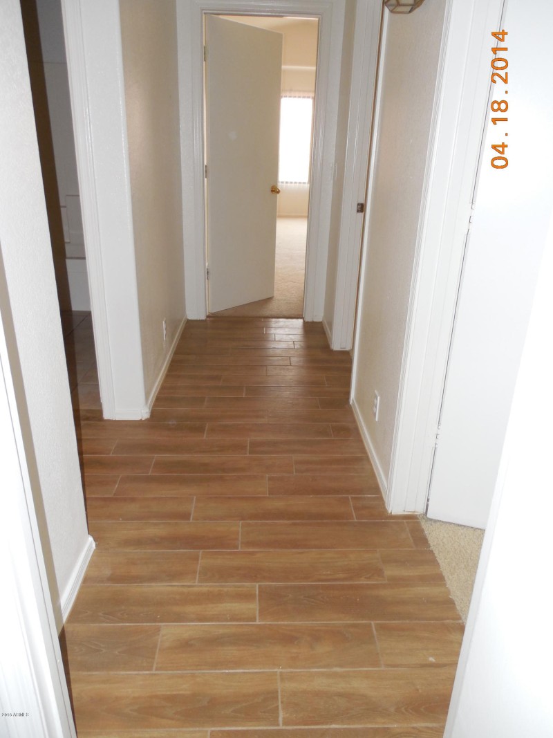 wood-look ceramic tile hallway 2
