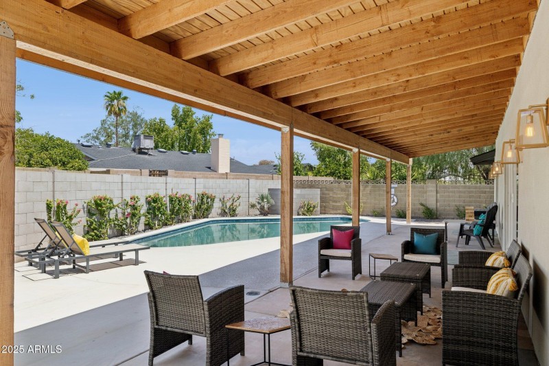 covered patio looking at the pool
