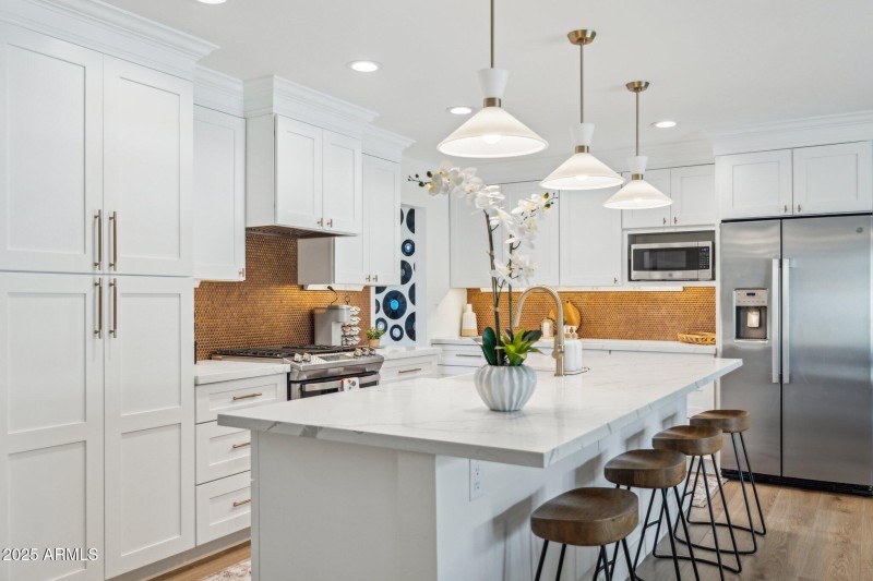 kitchen with walkway to the front living