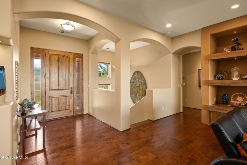 MAIN LEVEL - FOYER INTO MASTER & OFFICE