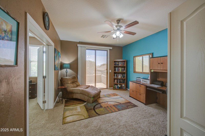 Primary bed sitting area w/balcony
