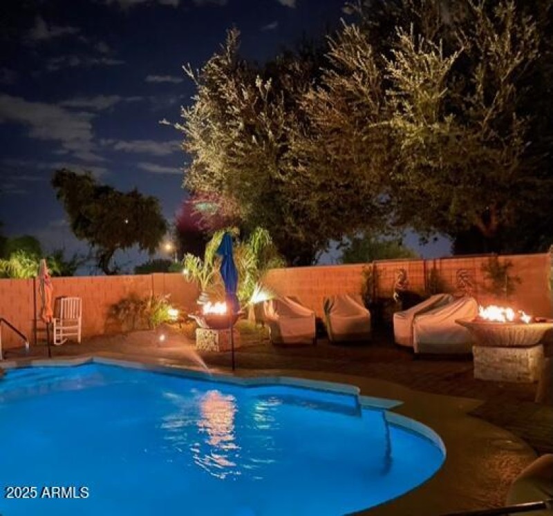Pool and Backyard at Night