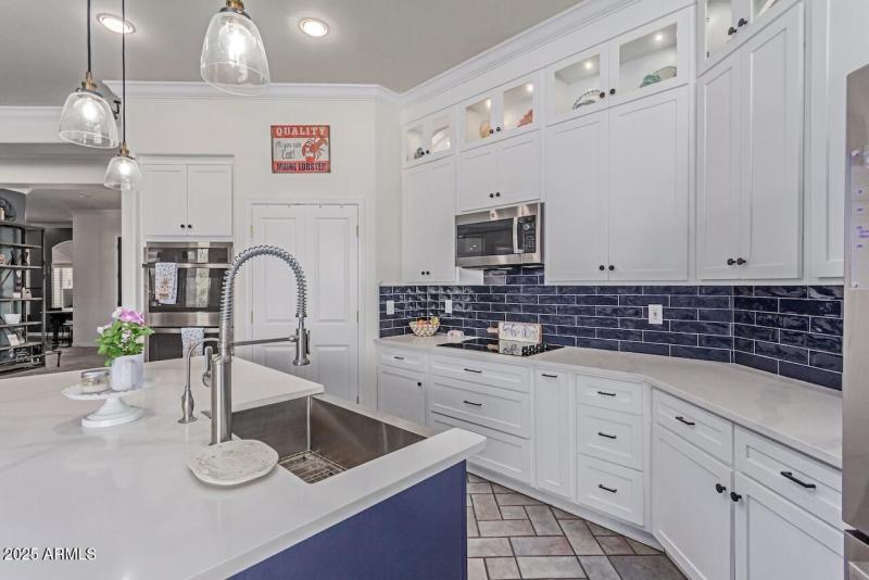 Kitchen with Granite Slab Counters