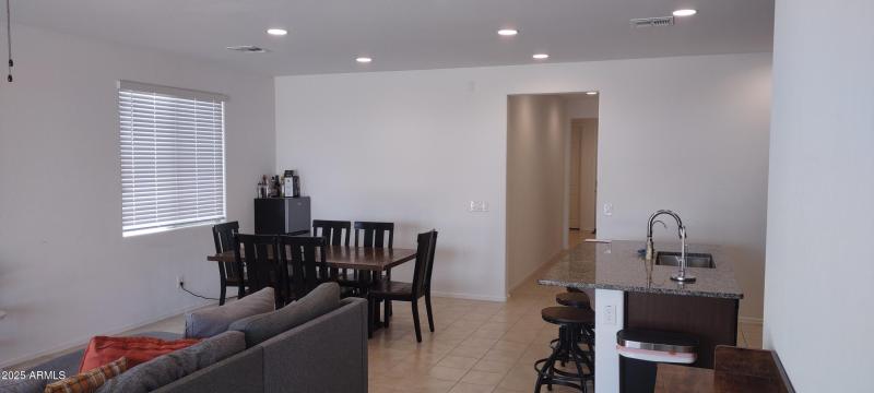 2025 BH living room to front door 100001