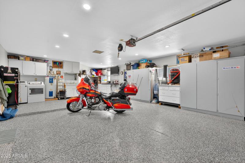 Laundry Area in Garage w/sink & cabinets
