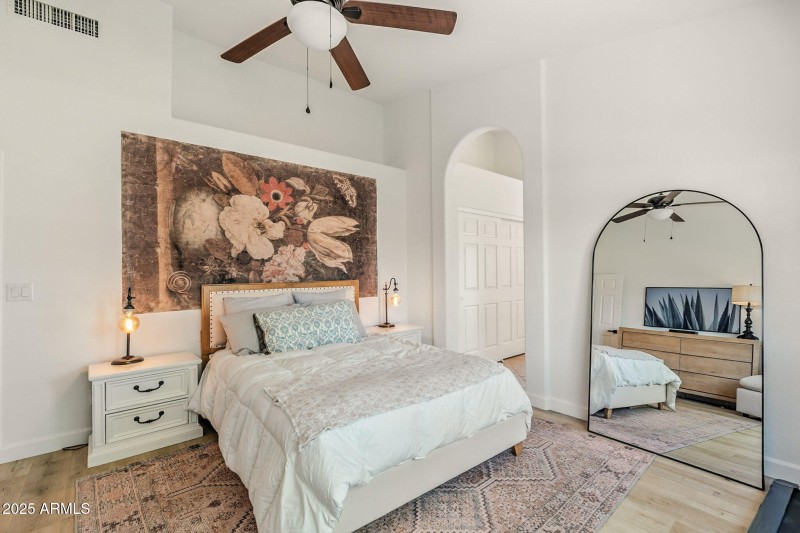 Vaulted bedroom ceiling.
