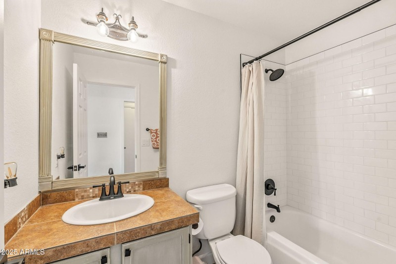 Hall bath with new subway tile.