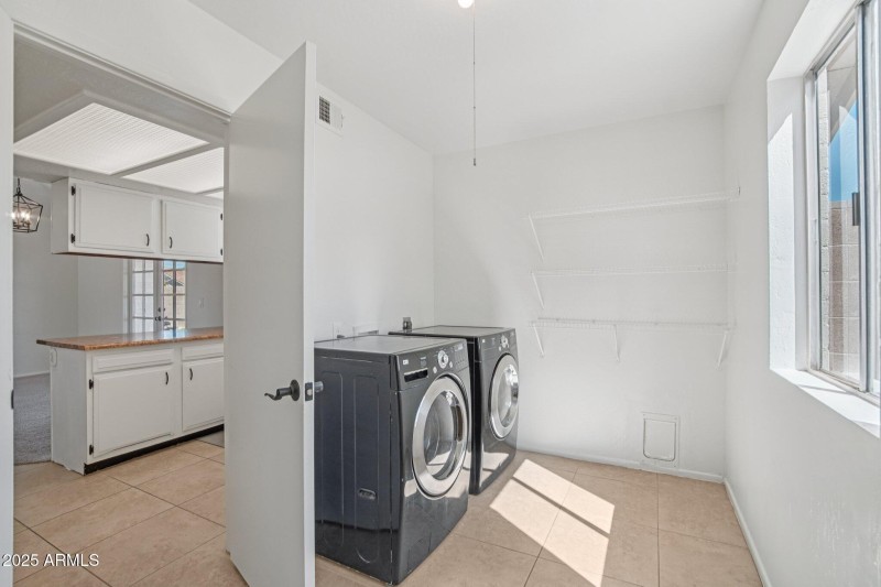 Oversized laundry area and pantry