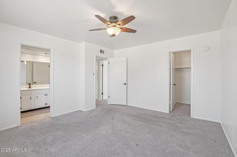 Primary Bedroom with walk-in closet