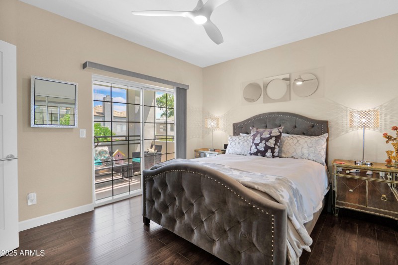MASTER SUITE W ACCESS OUT TO PVT PATIO
