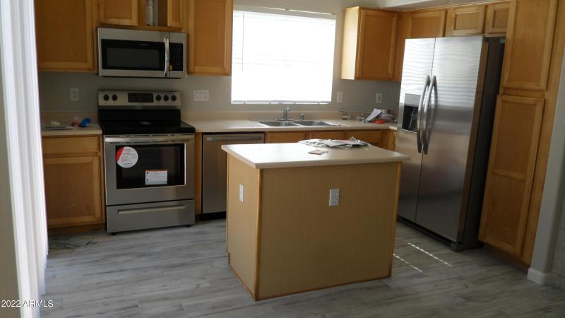 NEW STAINLESS STEEL APPLIANCES