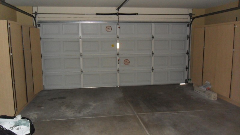 GARAGE W/ OPENER AND CABINETS