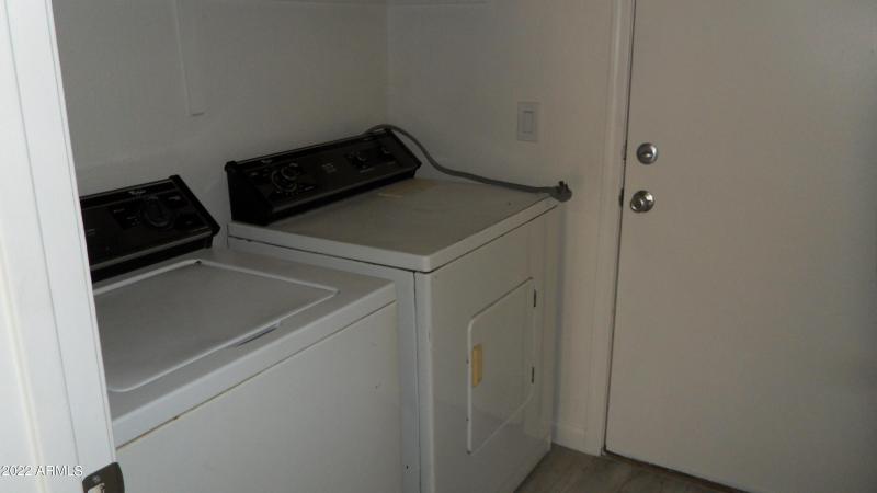 INSIDE LAUNDRY W/ WASHER & DRYER