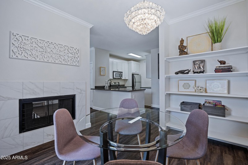 Two way fireplace w/shelving