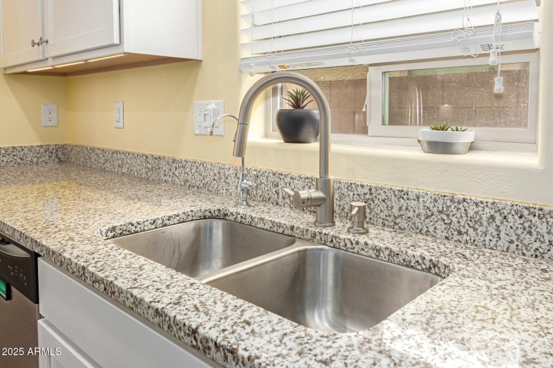 Granite counters throughout kitchen