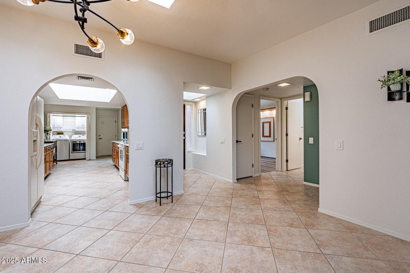 FOYER TO; GREAT ROOM, KITCHEN, BED & BAT