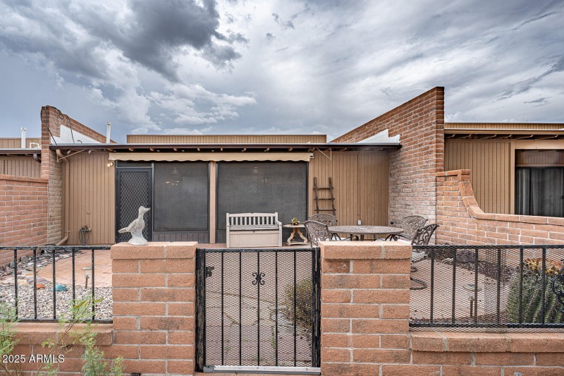 BACK YARD:SOLAR SHADE OFF OF AZ ROOM