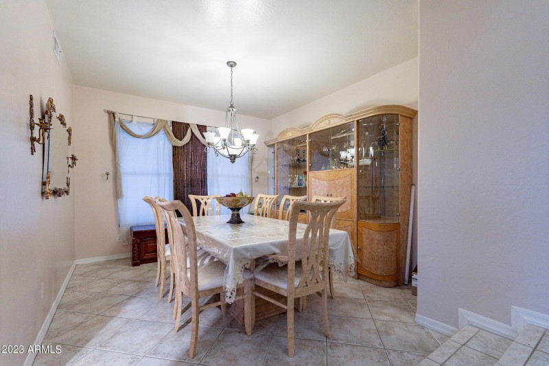 Step down into formal dining room