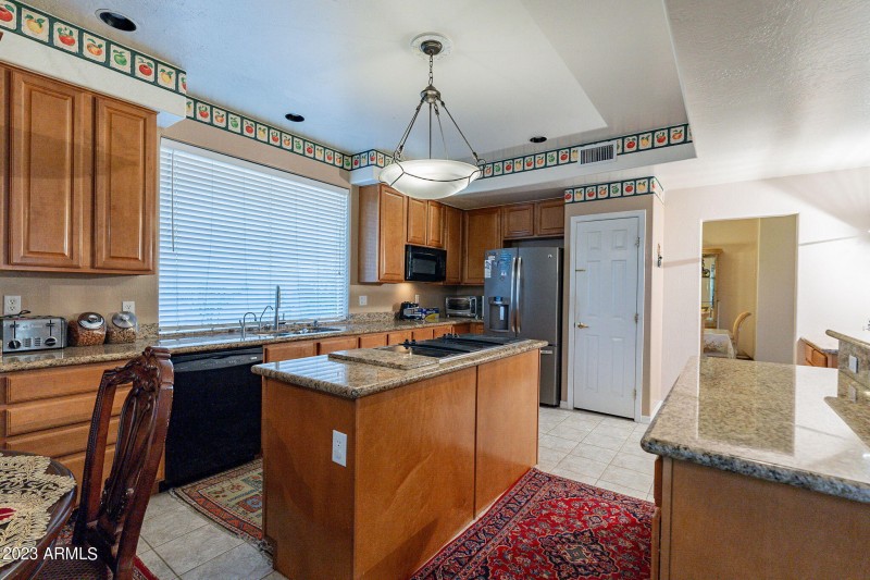 Kitchen island with cooktop
