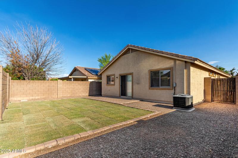 Wide Backyard with Paver Path